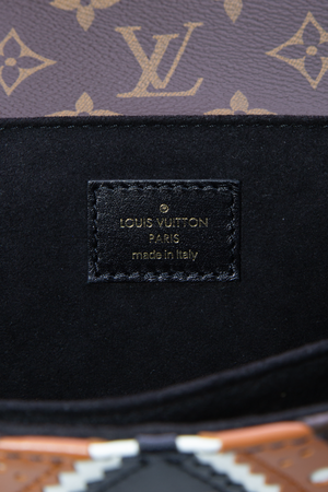 Louis Vuitton Monogram Brogue Rev Pochette Metis