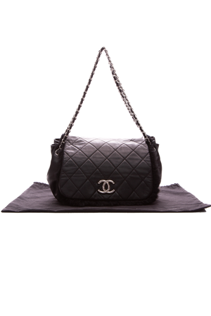 Chanel Quilted Fur Flap Bag