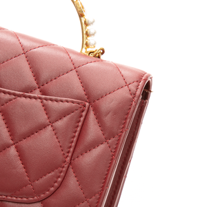 Chanel - Burgundy Pearl Handle WOC