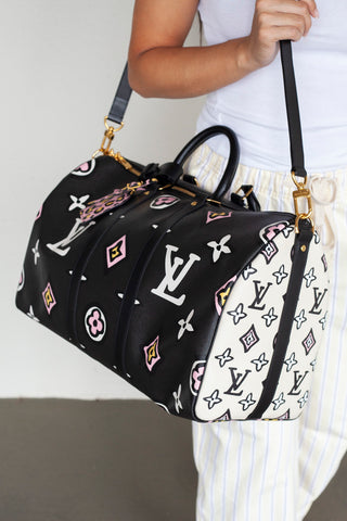 295368-louis-vuitton-wild-at-heart-keepall45-bandouliere-travel-bag