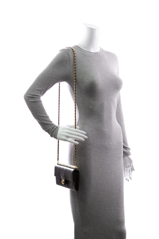 Chanel-Chic-Pearls-Clutch-with-Chain-300509