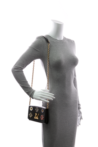 298867-louis-vuitton-Mechanical-Flowers-Twist-Wallet-On-Chain-Bag