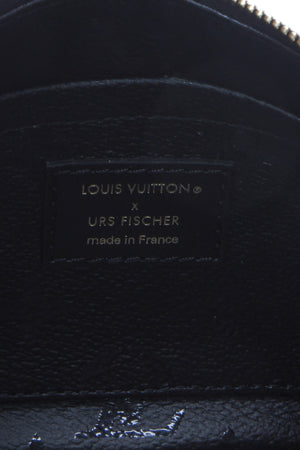 At Auction: Louis Vuitton, LOUIS VUITTON. Red URS Fisher pochette bag.  Black leather with red monograms. Short handle in red leather. Comes with dust  bag. Black interior. Zipper closure. In good condition.
